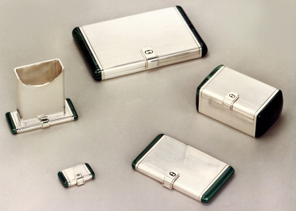 Gucci silver products by Salimbeni. Boxes and pill boxes with onyx or malachite details. 
